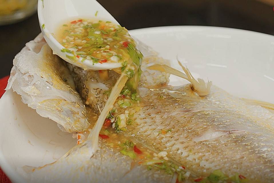 pour the sauce onto the steamed fish